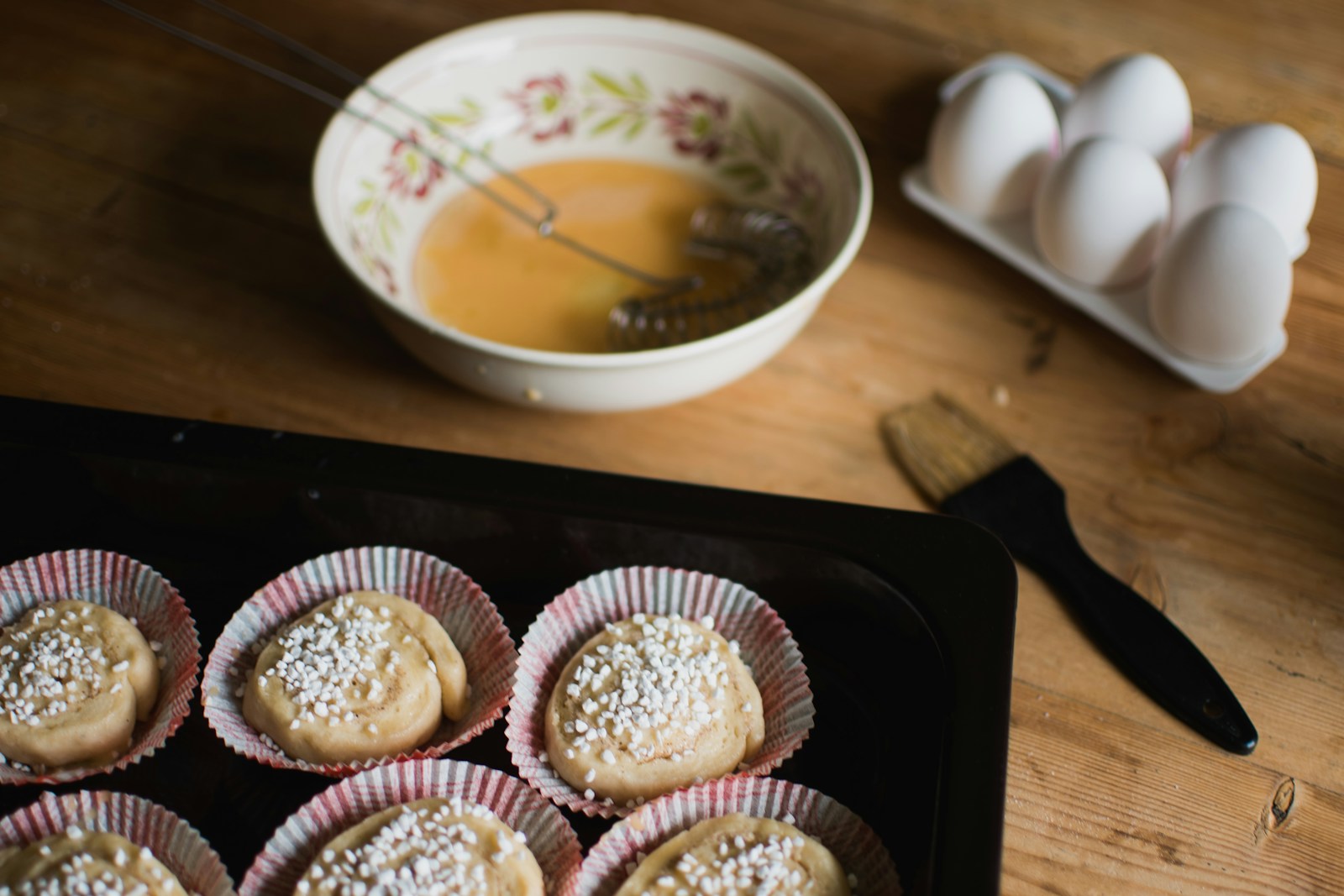 Cupcakes arranged on a dark plate