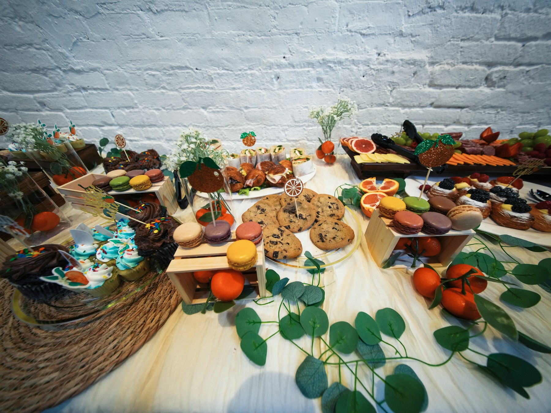 Dessert table with cookies, macarons and cupcakes